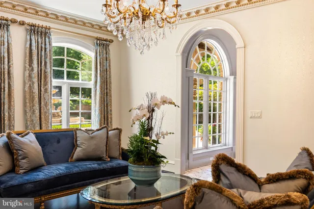 a view of an entryway with wooden floor and door