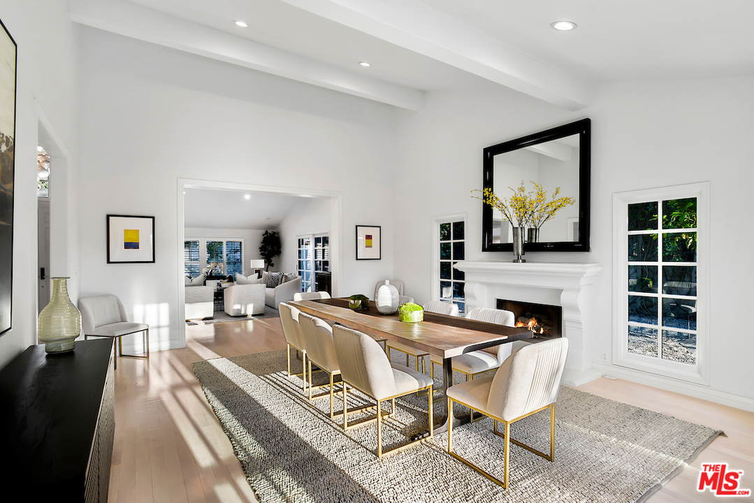 9653 Wendover Drive Beverly Hills, CA 90210 - Photo 13 of 34 a living room with fireplace furniture and a flat screen tv