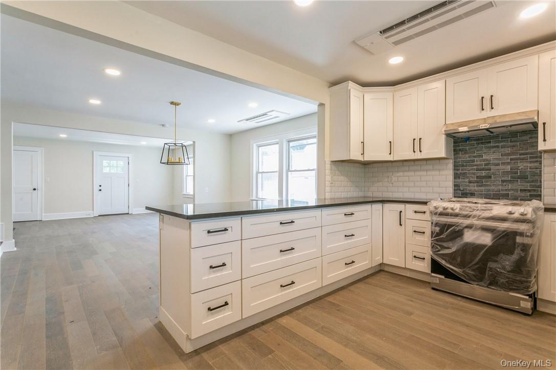 215 Purchase Street, Unit A Rye, NY 10580 - Photo 9 of 21 Kitchen into Dining Area - Living RM