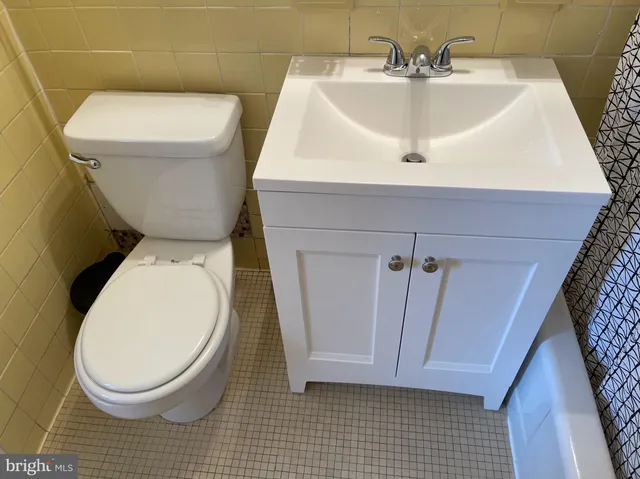 a kitchen with a sink and a stove