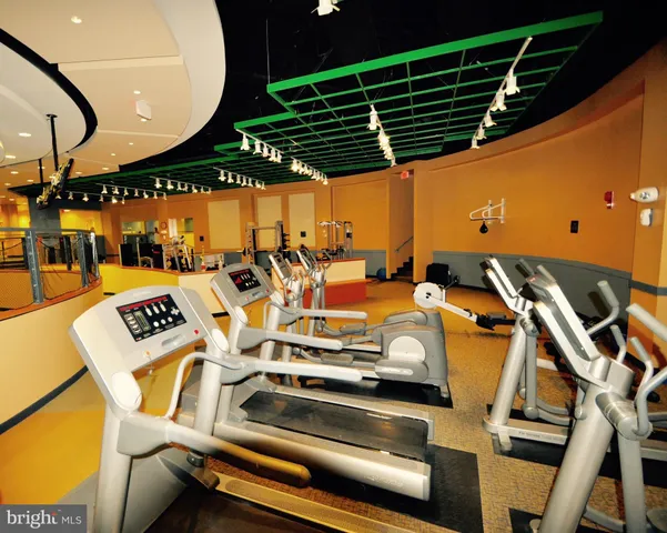 a view of a swimming pool with a yard