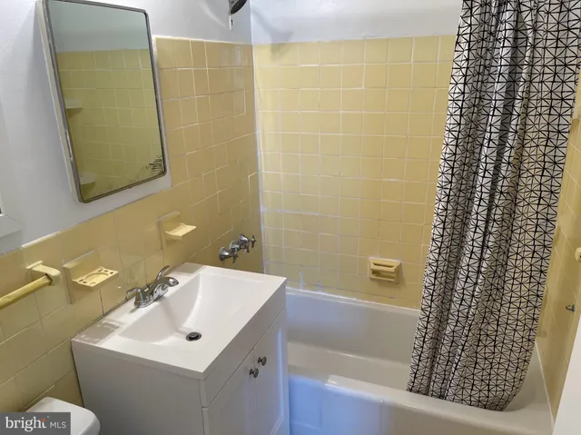 a bathroom with a sink and a bathtub