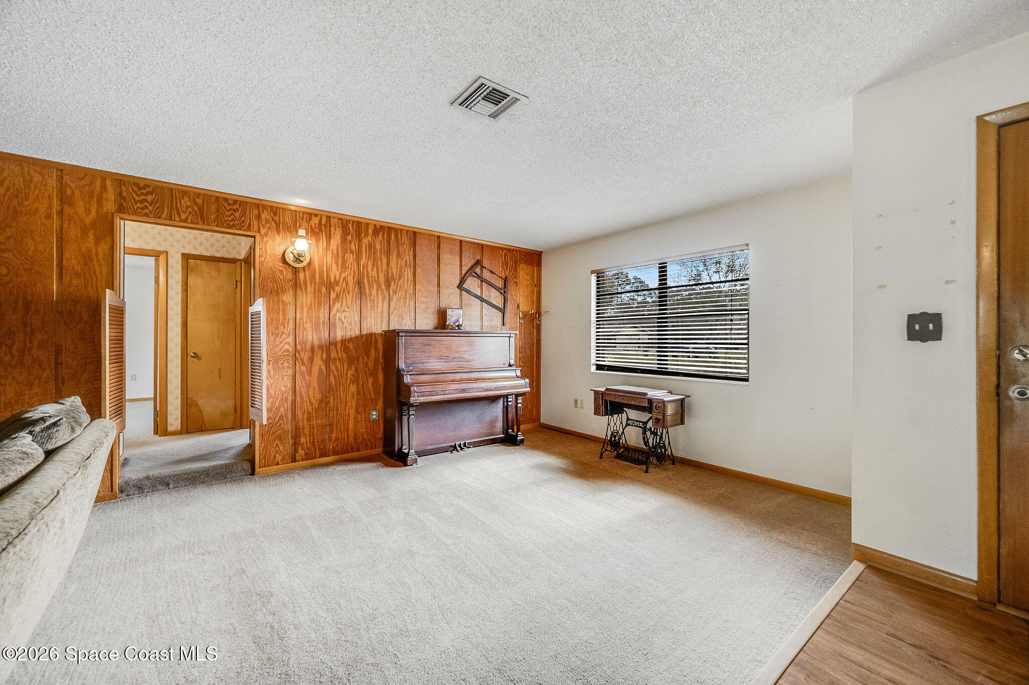 4600 Janet Road Cocoa, FL 32926 - Photo 14 of 50 a room with furniture and a window