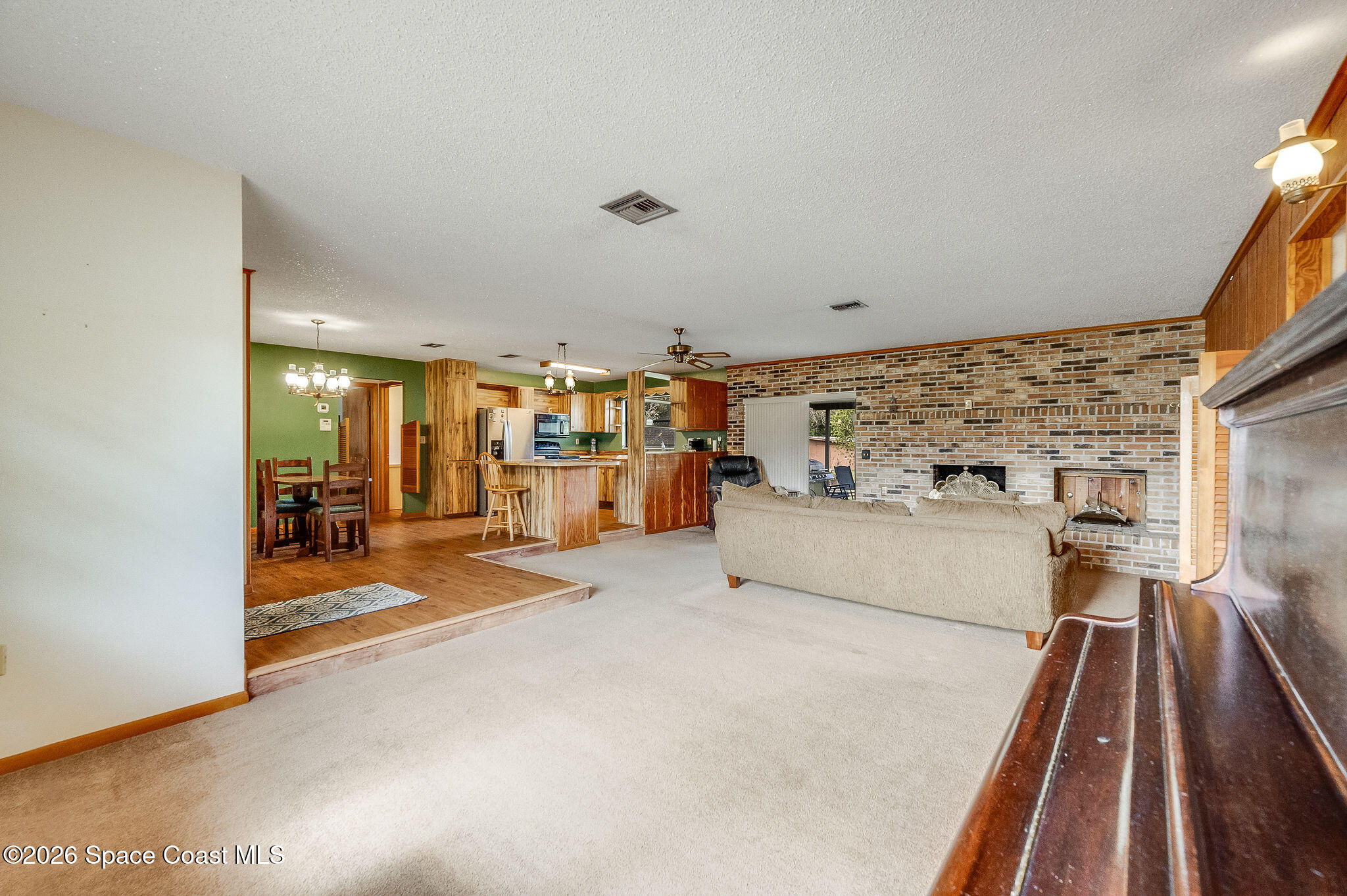 4600 Janet Road Cocoa, FL 32926 - Photo 16 of 50 a view of a living room and a garage