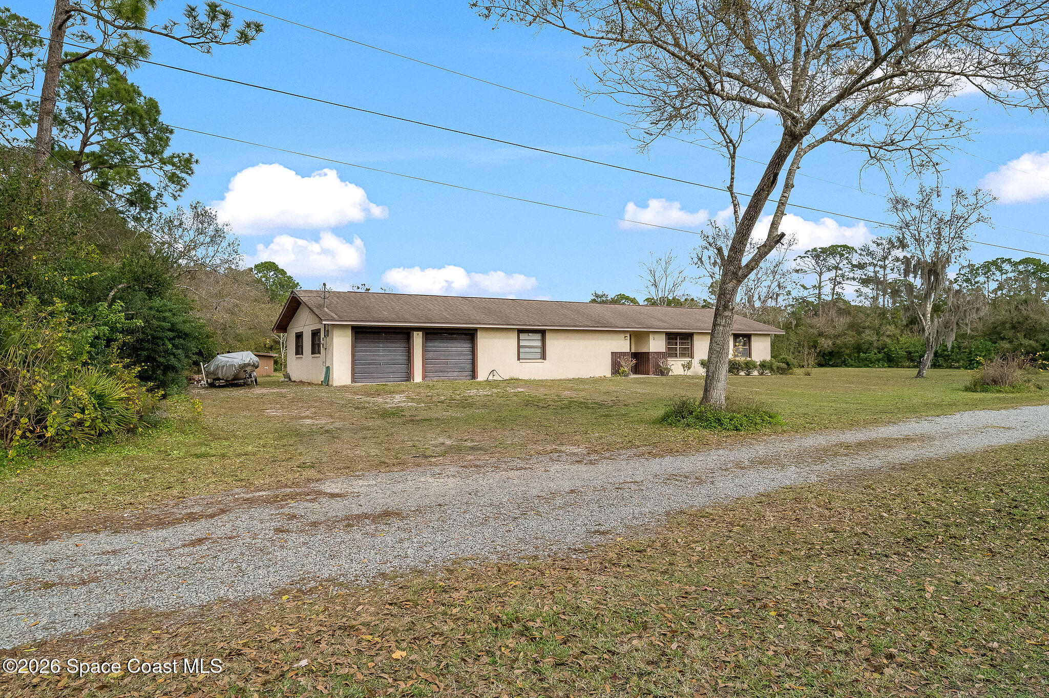4600 Janet Road Cocoa, FL 32926 - Photo 39 of 50 a front view of a house with a yard