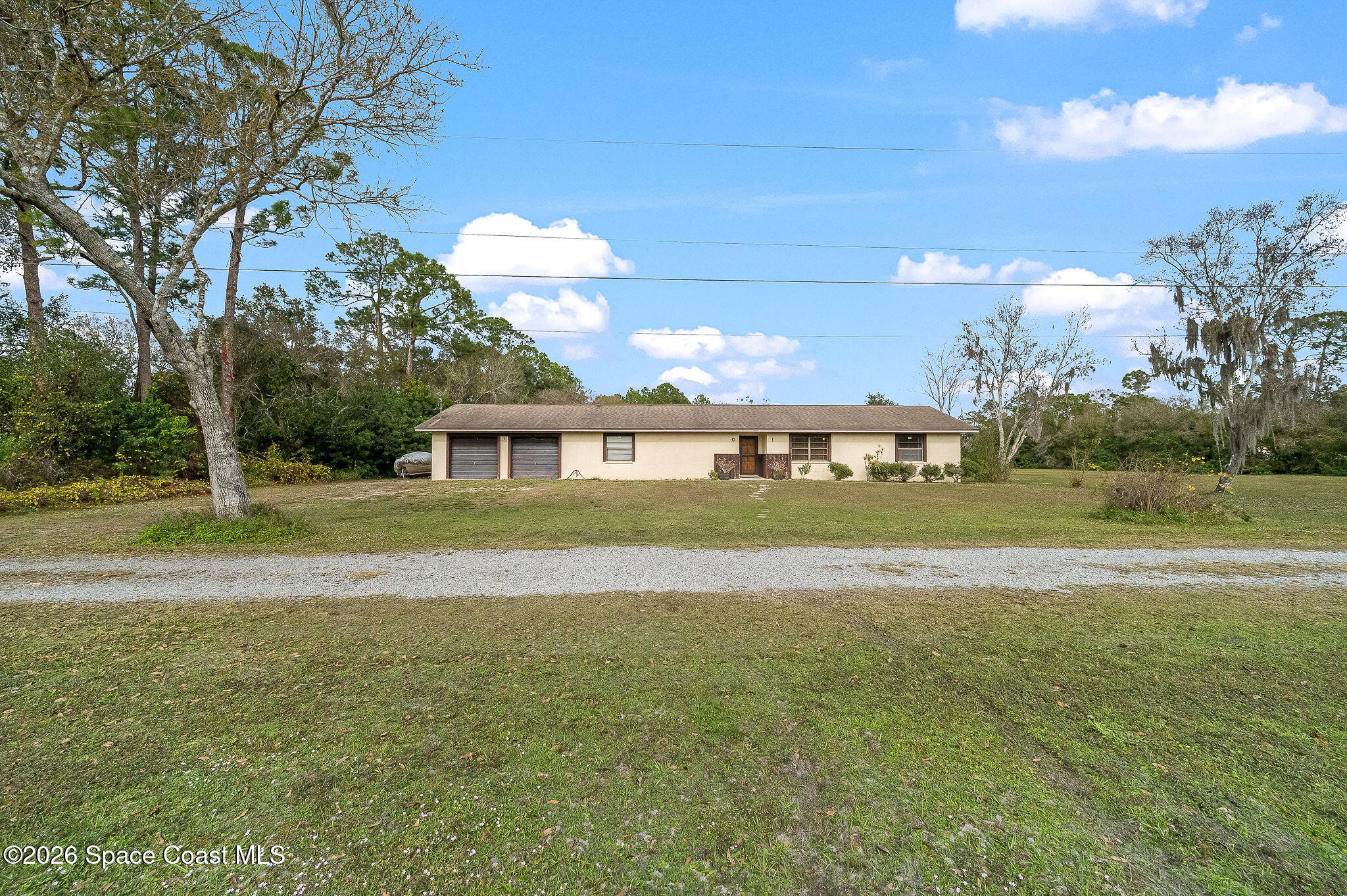 4600 Janet Road Cocoa, FL 32926 - Photo 40 of 50 a view of house with a big yard