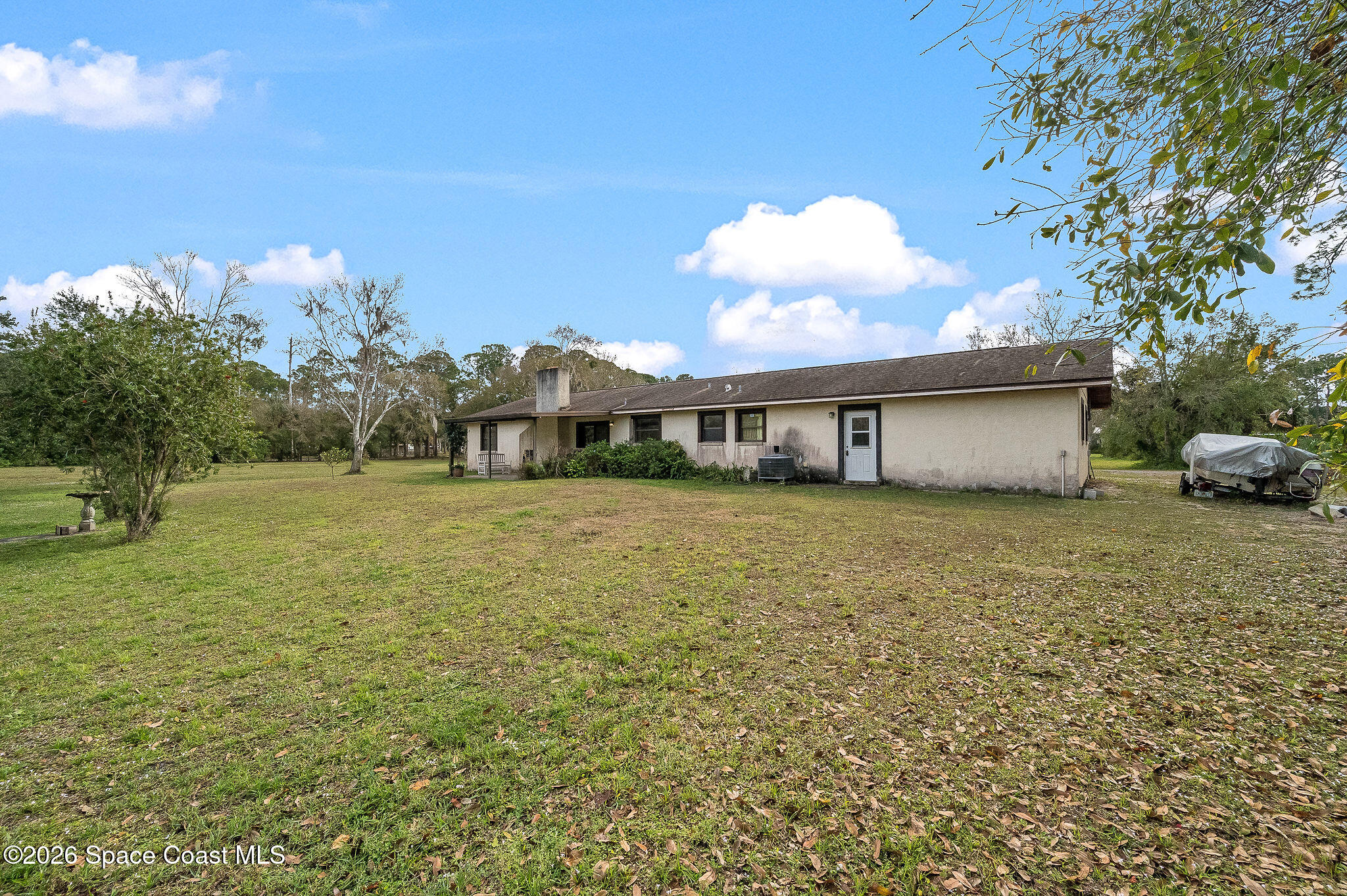 4600 Janet Road Cocoa, FL 32926 - Photo 44 of 50 a front view of a house with a yard