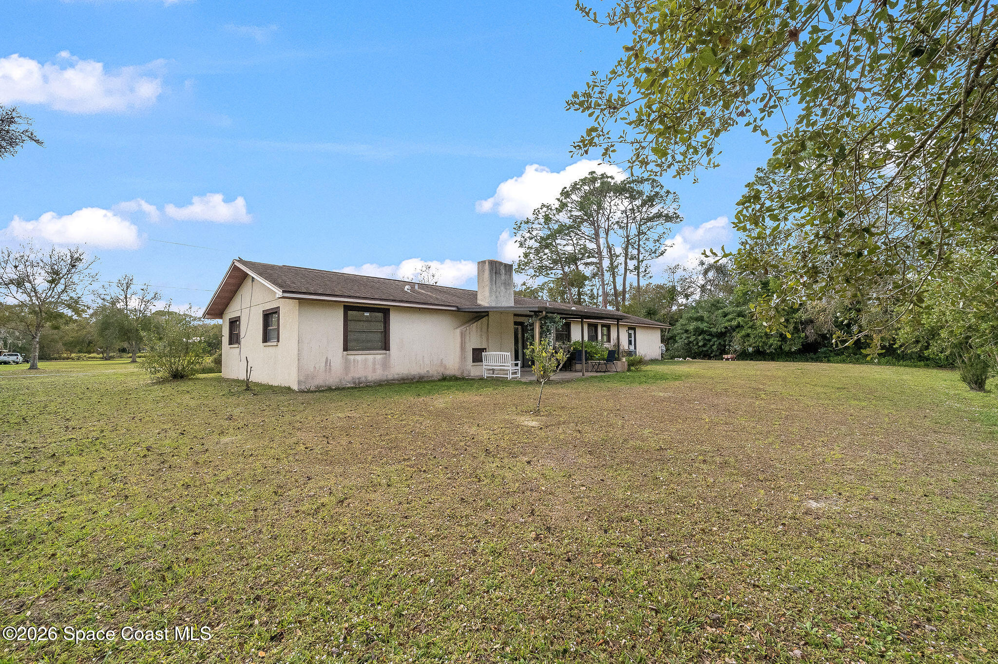 4600 Janet Road Cocoa, FL 32926 - Photo 46 of 50 a view of a house with backyard and garden