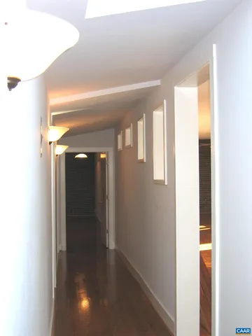 a view of hallway with livingroom