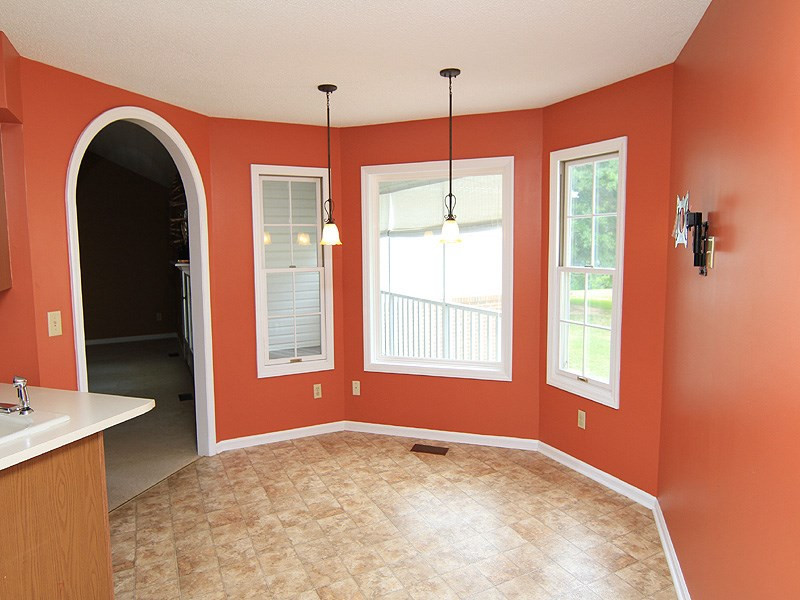 407 County Line Road Timberlake, NC 27583 - Photo 8 of 21 Large breakfast area with great view of the property. Breakfast Area