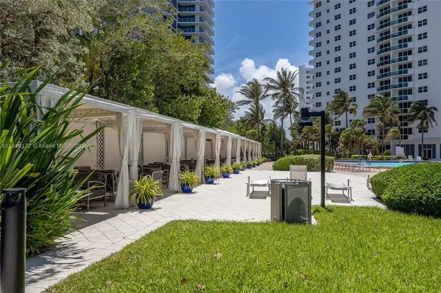 a front view of a house with a large window
