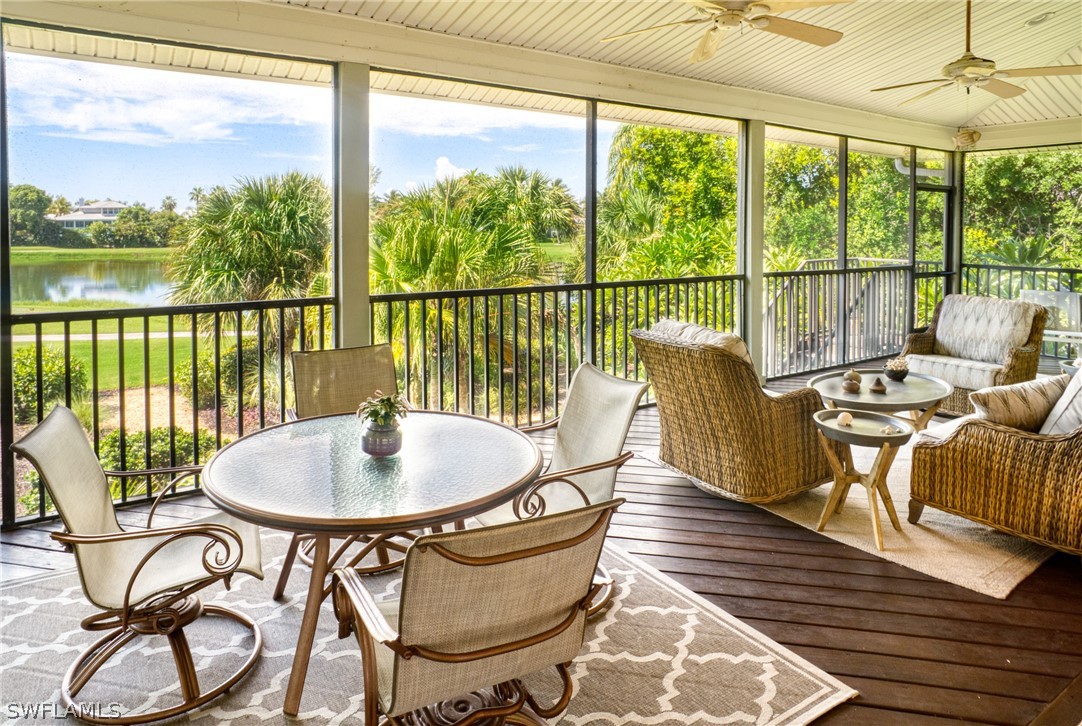 1585 Sand Castle Road Sanibel, FL 33957 - Photo 18 of 34 a dining room with furniture window and wooden floor