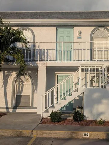 a view of swimming pool with outdoor seating