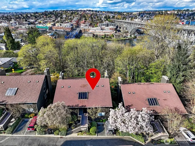 an aerial view of residential house with outdoor space and swimming pool