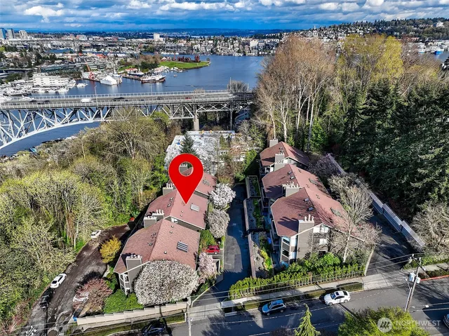 a view of multiple houses with outdoor space
