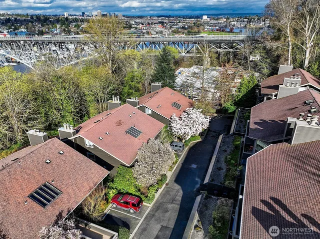 an aerial view of a house with a lake view