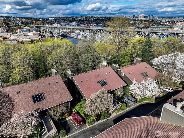 an aerial view of a house with a lake view