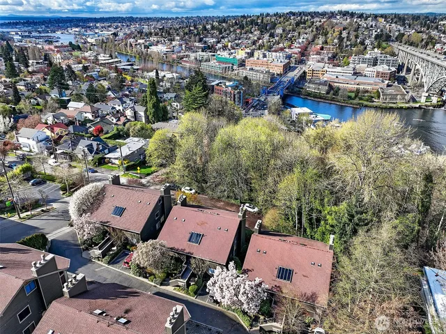 an aerial view of a house with a lake view