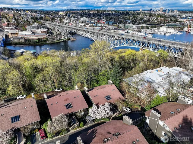 an aerial view of a house with a lake view
