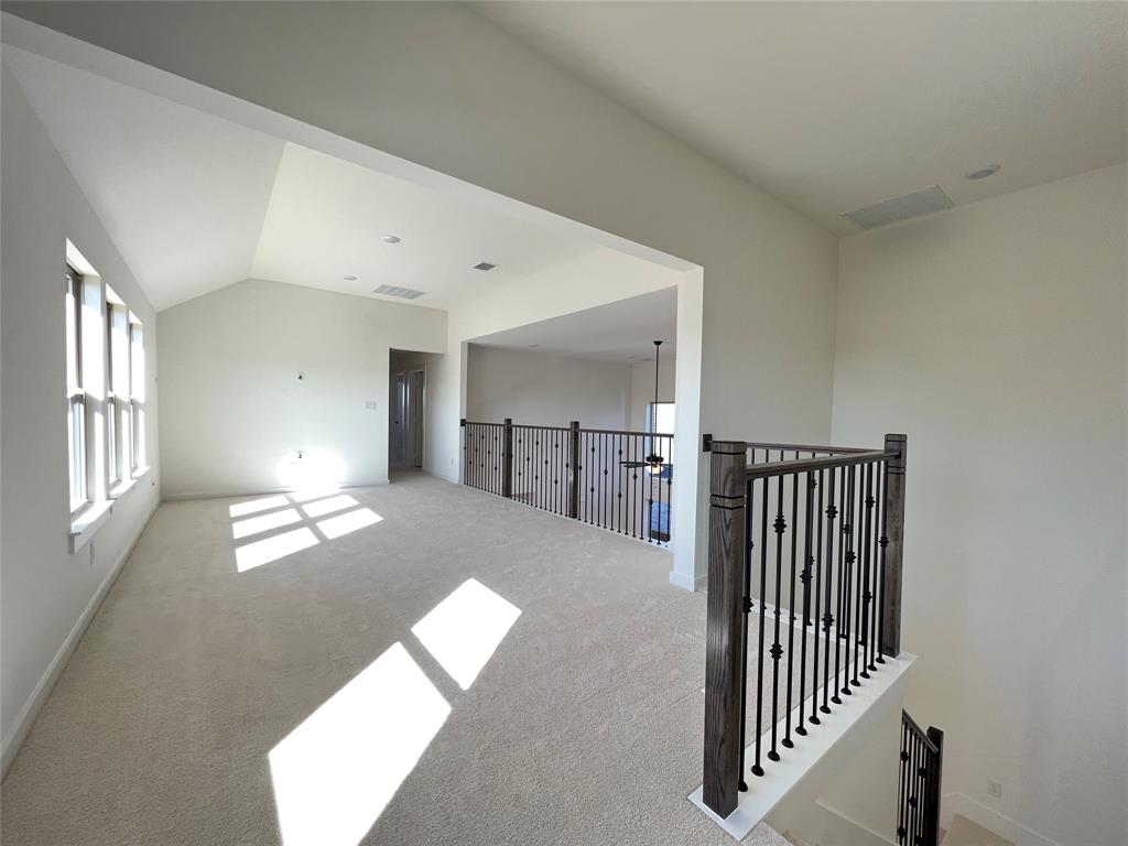 15625 Hawks Pass Road Frisco, TX 75035 - Photo 15 of 27 a view of a hallway with windows