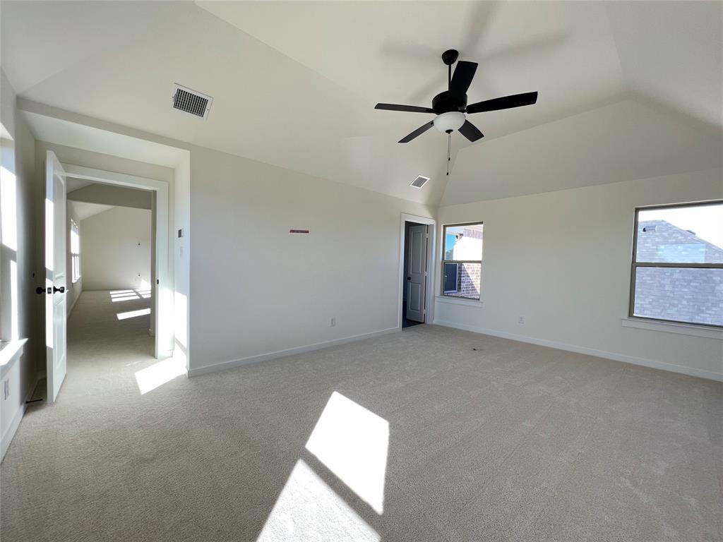 15625 Hawks Pass Road Frisco, TX 75035 - Photo 16 of 27 a view of empty room with ceiling fan