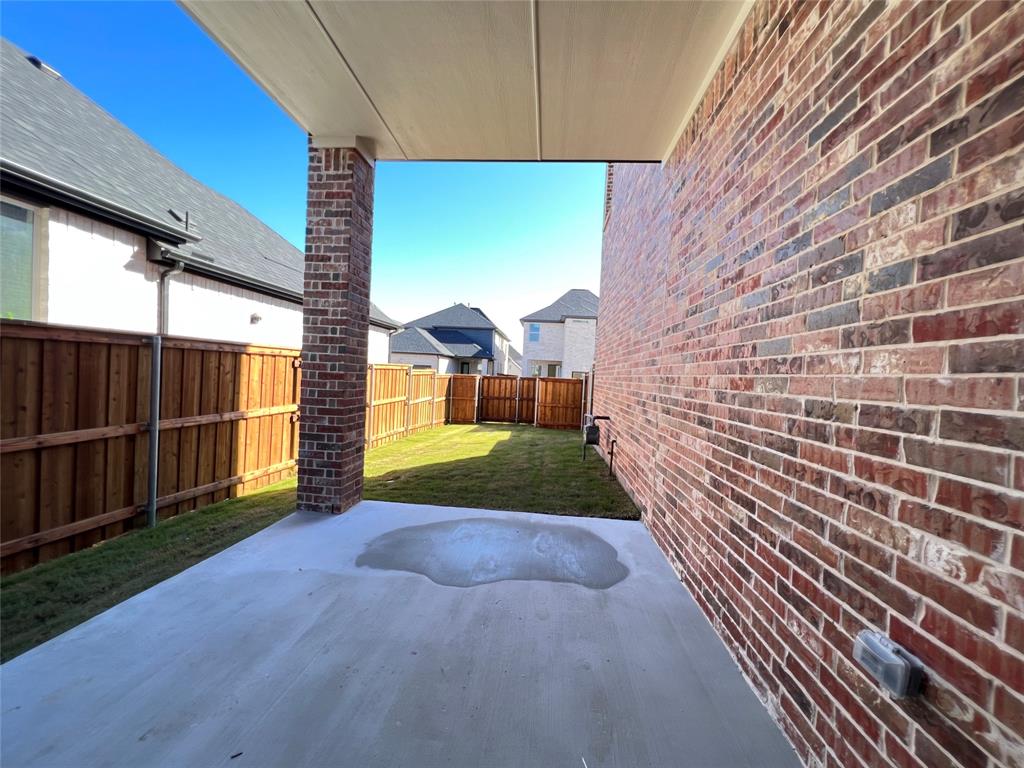 15625 Hawks Pass Road Frisco, TX 75035 - Photo 27 of 27 a view of a backyard