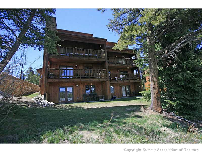 875 4 O Clock Road, Unit 2 Breckenridge, CO 80424 - Photo 4 of 13 a view of a house with a yard