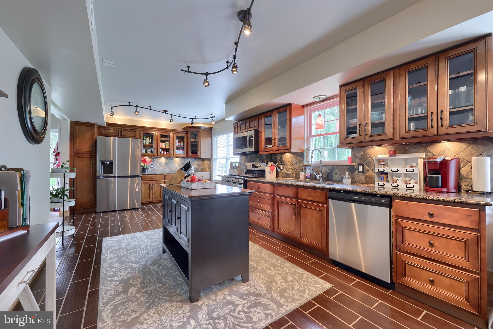 100 Roxberry Drive Reading, PA 19608 - Photo 15 of 46 a kitchen with granite countertop lots of counter top space and stainless steel appliances