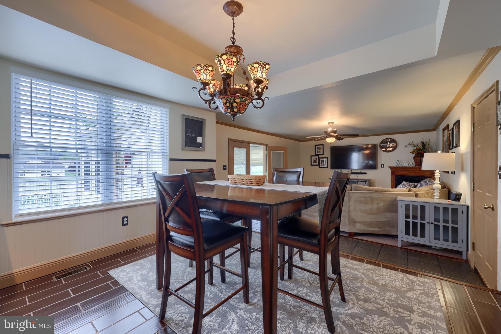 100 Roxberry Drive Reading, PA 19608 - Photo 21 of 46 a dining room with furniture a chandelier and window