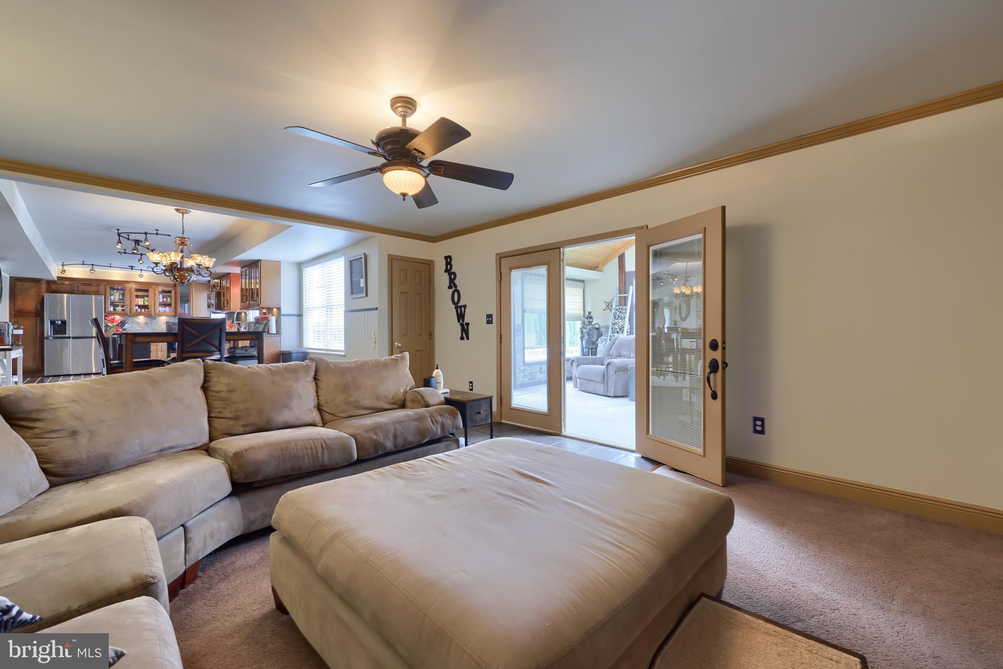 100 Roxberry Drive Reading, PA 19608 - Photo 23 of 46 a living room with furniture ceiling fan and a rug