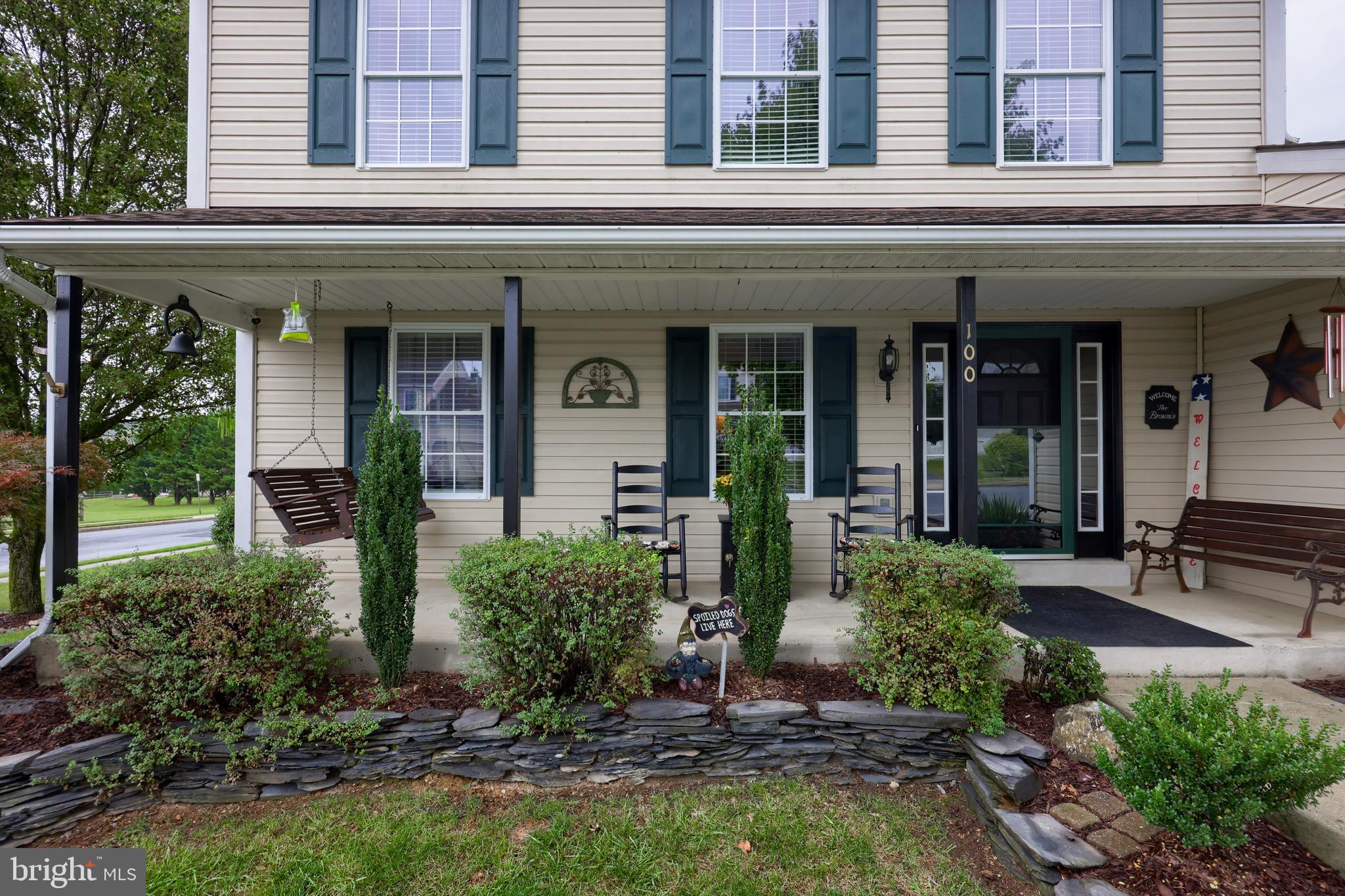 100 Roxberry Drive Reading, PA 19608 - Photo 4 of 46 front view of a building with a porch