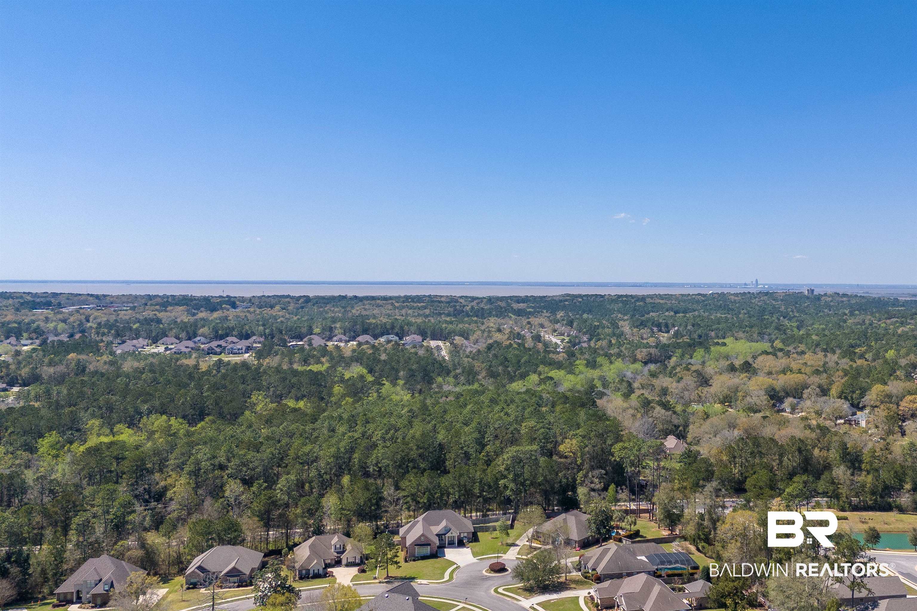 27888 Oakachoy Loop Daphne, AL 36526 - Photo 65 of 65 Aerial view with a forest view and a residential view