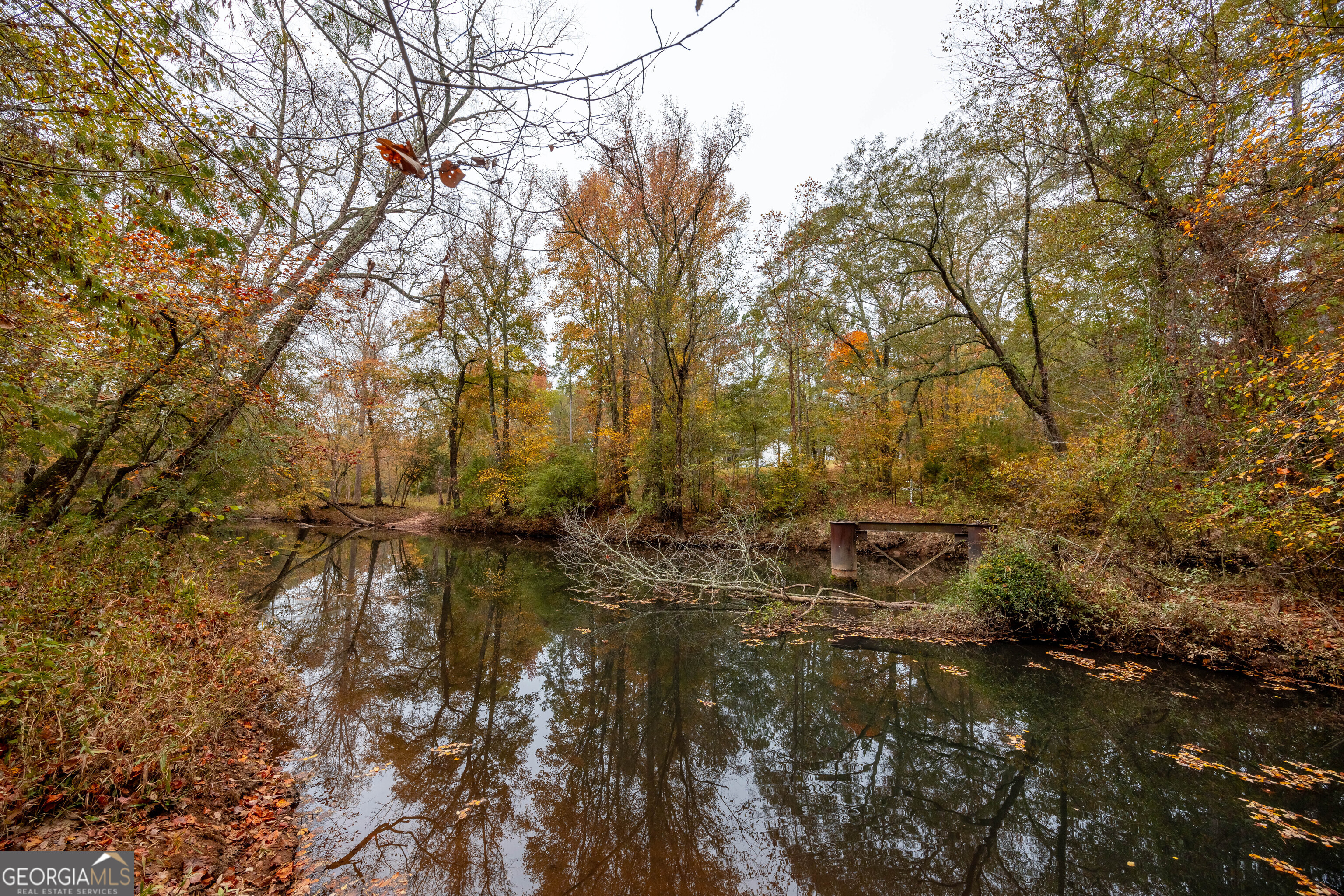 0 Bullock Bridge Road, Unit TRACT 2 Loganville, GA 30656 - Photo 5 of 36 a view of a lake with houses