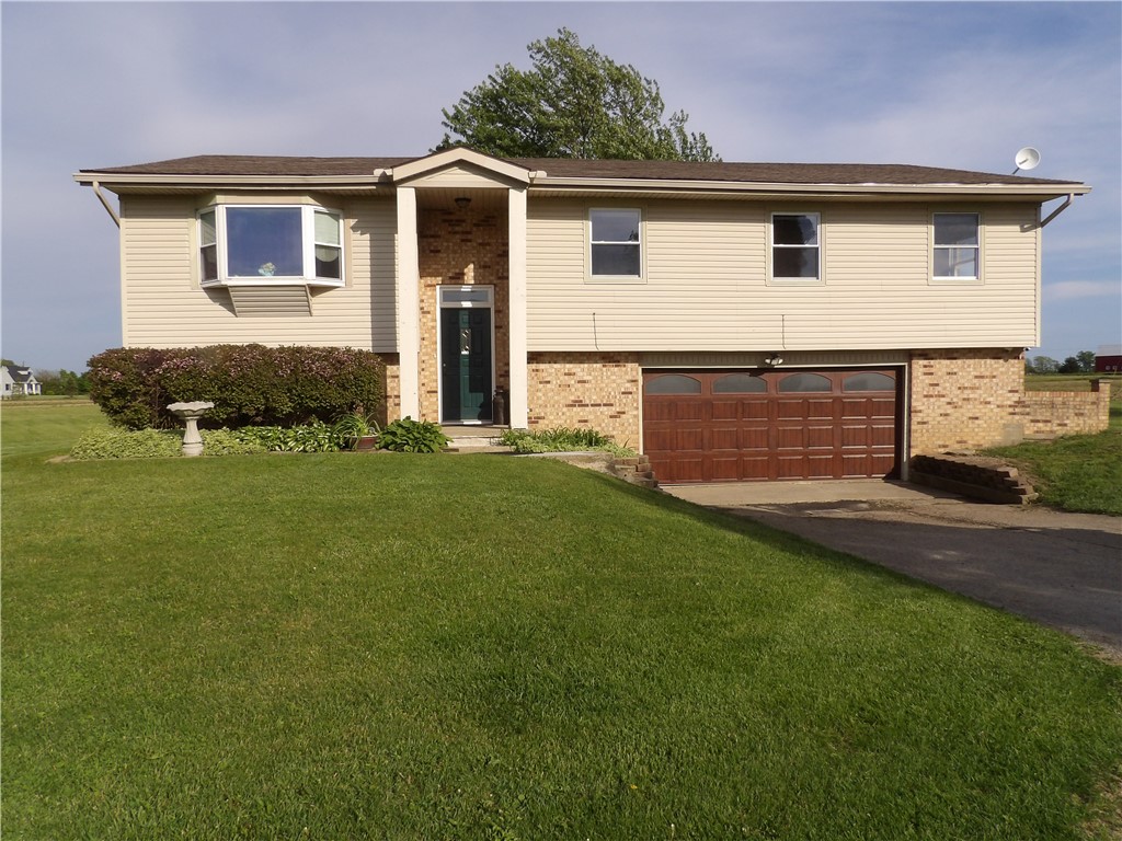 A classic exterior with a well-maintained lawn and inviting curb appeal awaits.