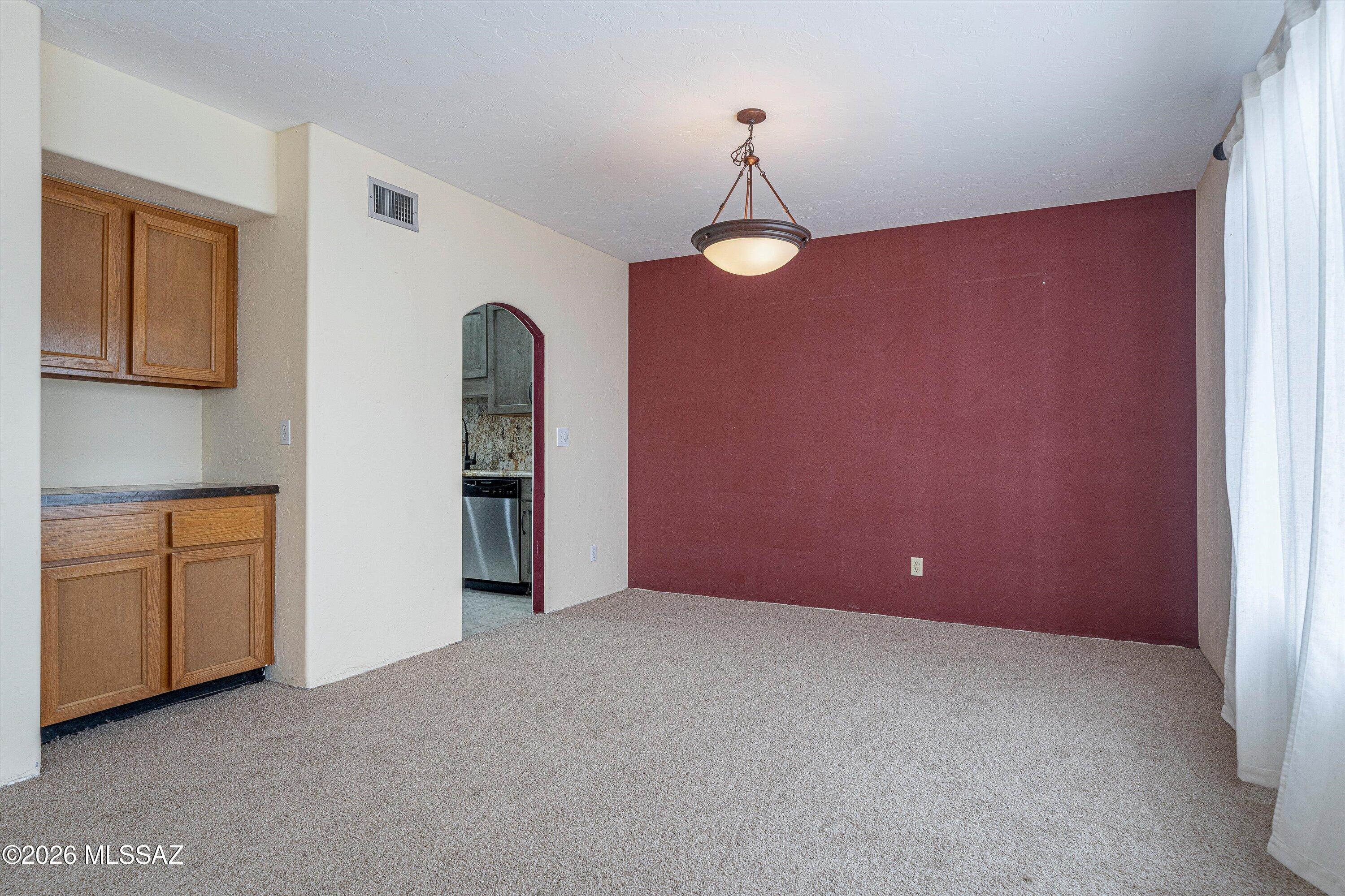 10961 East Roger Road Tucson, AZ 85749 - Photo 28 of 45 Dining area with dry bar