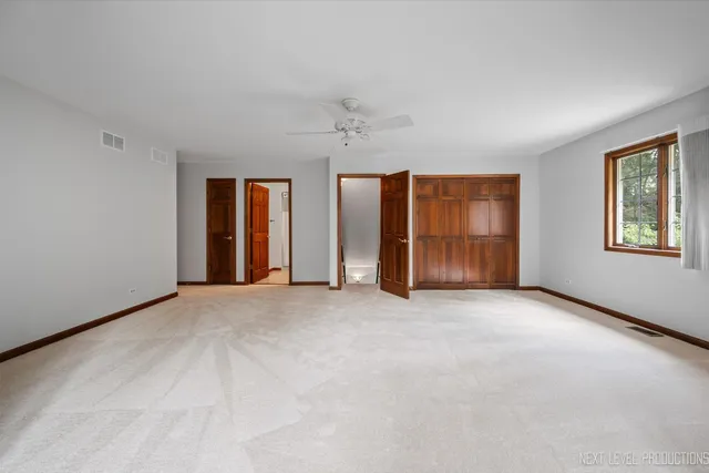 a bathroom with a sink toilet and a mirror