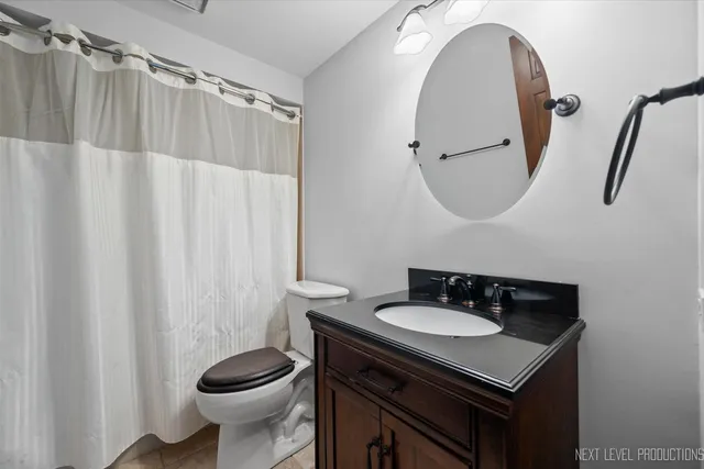 a view of an empty room with furniture