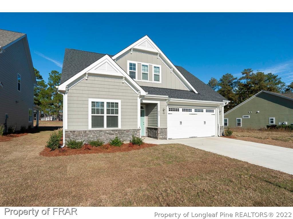 475 Kerr Lake Road Aberdeen, NC 28315 - Photo 2 of 29 a front view of a house with a yard