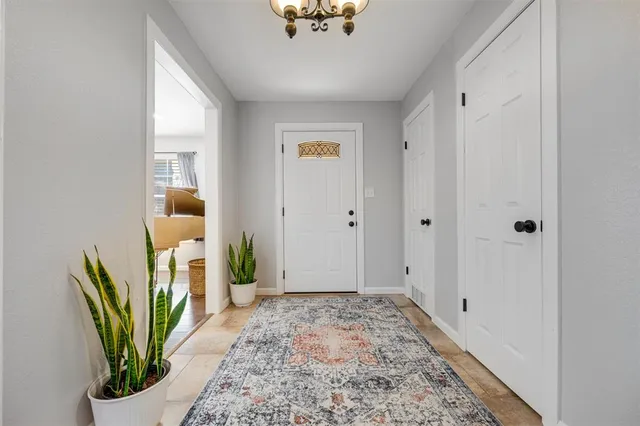 a view of entryway with wooden floor