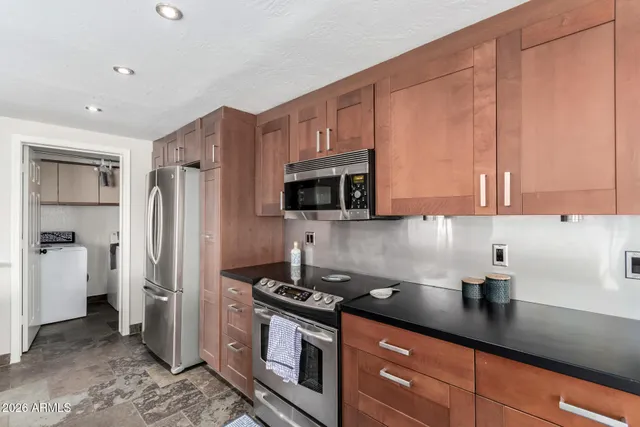 a bathroom with a toilet and a sink