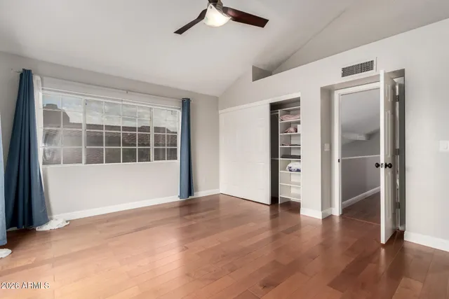 a front view of a house with outdoor seating and mountain view