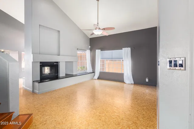a view of a backyard with sitting area and furniture