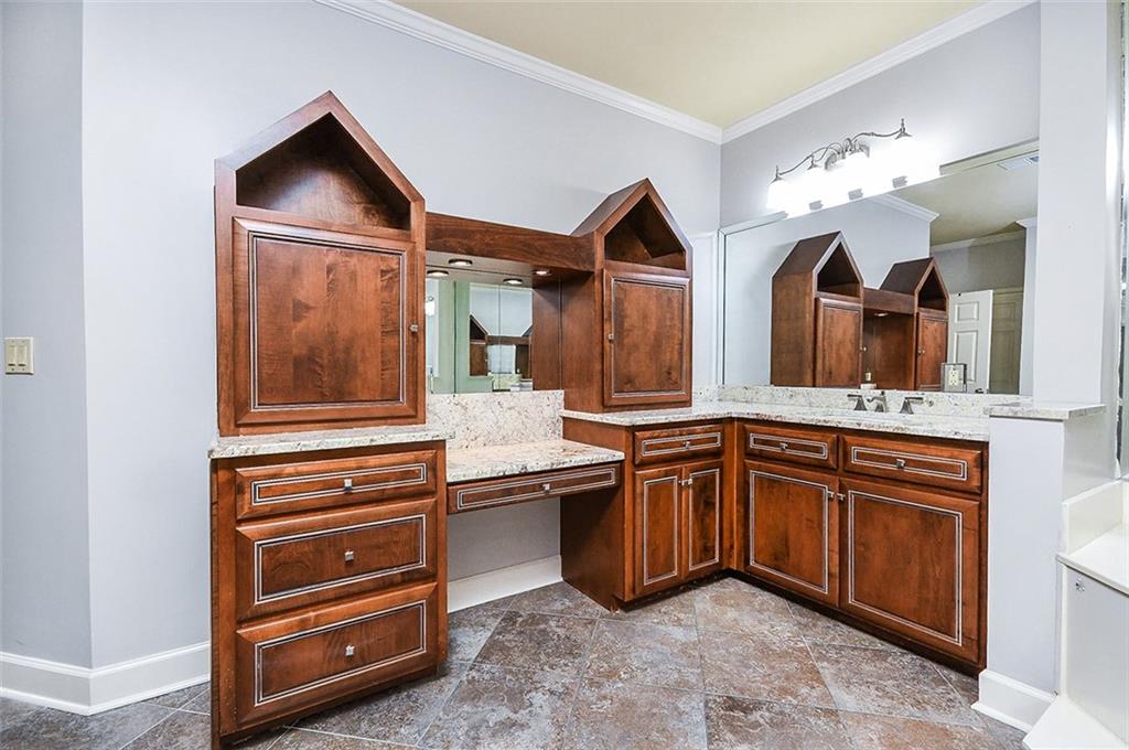 2865 Lenox Road Northeast, Unit 407 Atlanta, GA 30324 - Photo 17 of 27 a kitchen with a sink and cabinets