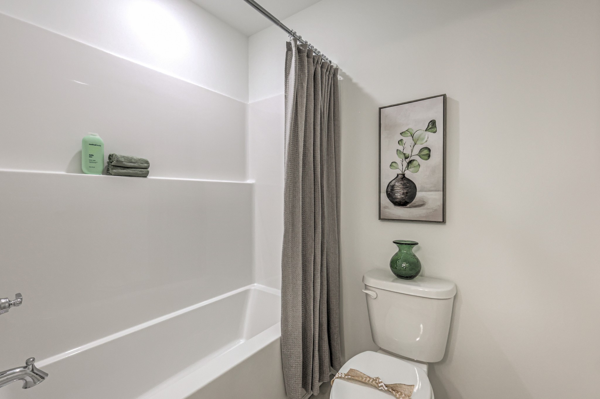 537 Misty Creek Nashville, TN 37207 - Photo 28 of 64 a white toilet sitting next to a bathroom sink and tub