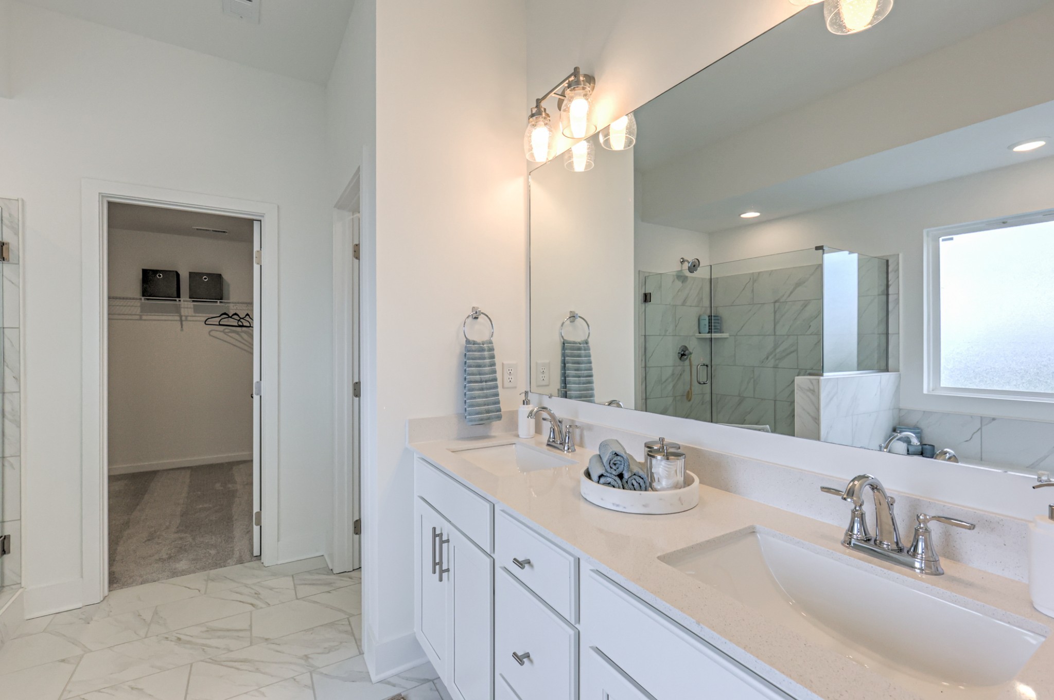 537 Misty Creek Nashville, TN 37207 - Photo 40 of 64 a bathroom with double vanity sinks and a mirror