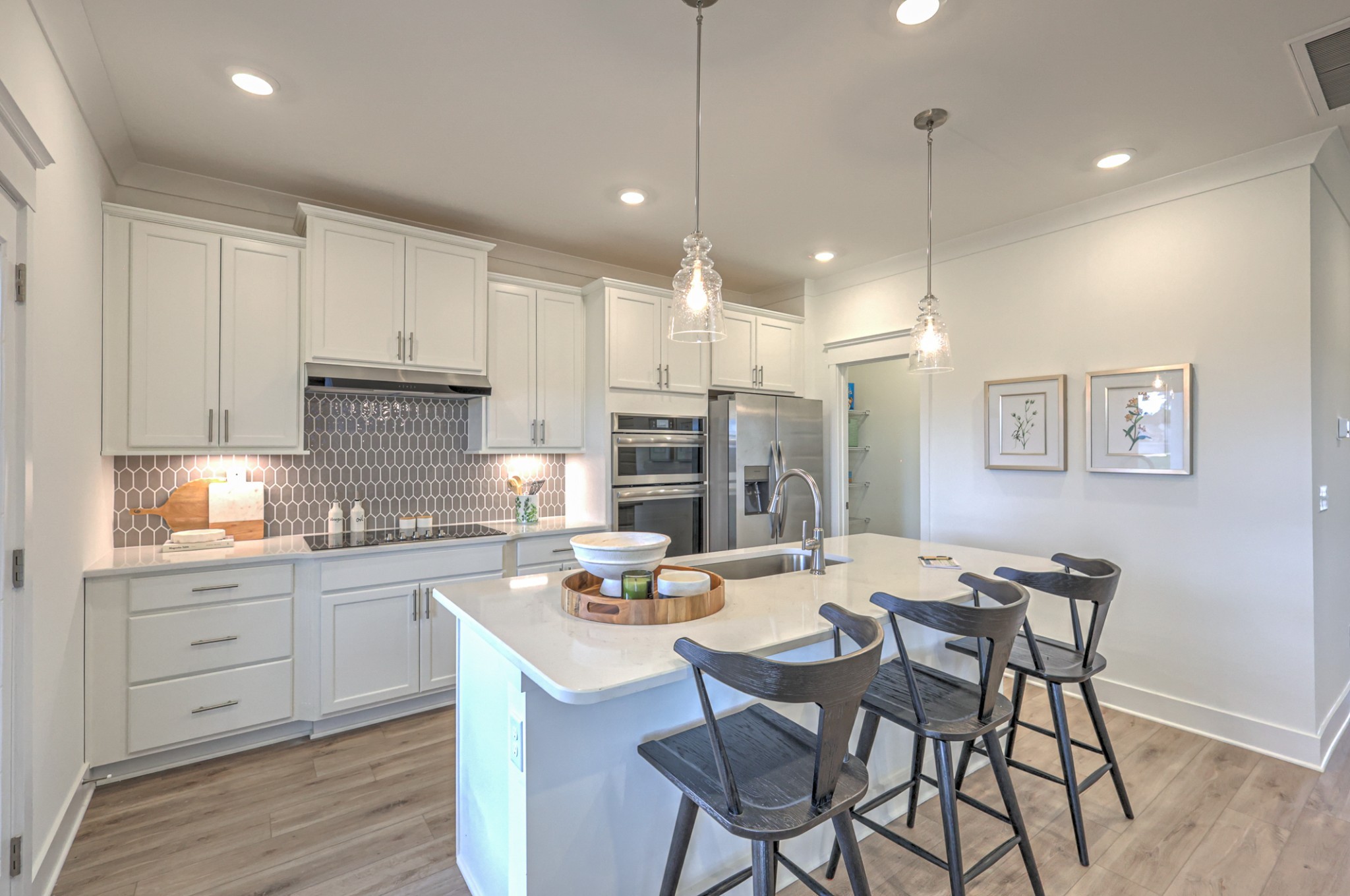 537 Misty Creek Nashville, TN 37207 - Photo 51 of 64 a kitchen with a dining table chairs sink and cabinets