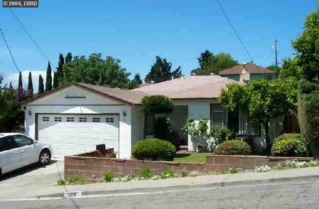 1312 Seventh Street Rodeo, CA 94572 - Photo 1 of 1 a front view of a house with garden
