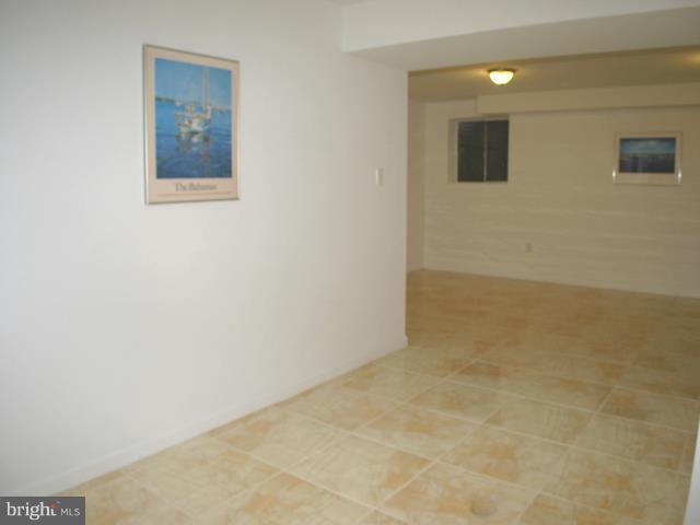 9247 Three Oaks Drive Silver Spring, MD 20901 - Photo 1 of 30 a view of a hallway