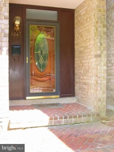 9247 Three Oaks Drive Silver Spring, MD 20901 - Photo 2 of 30 a view of a entryway door