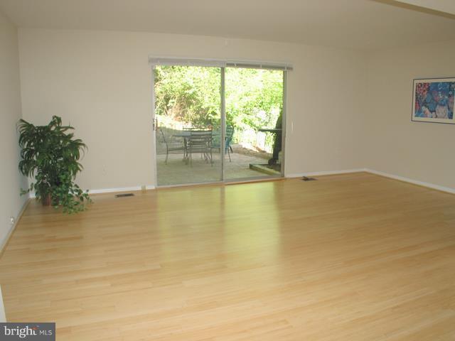 9247 Three Oaks Drive Silver Spring, MD 20901 - Photo 13 of 30 a view of an empty room and window